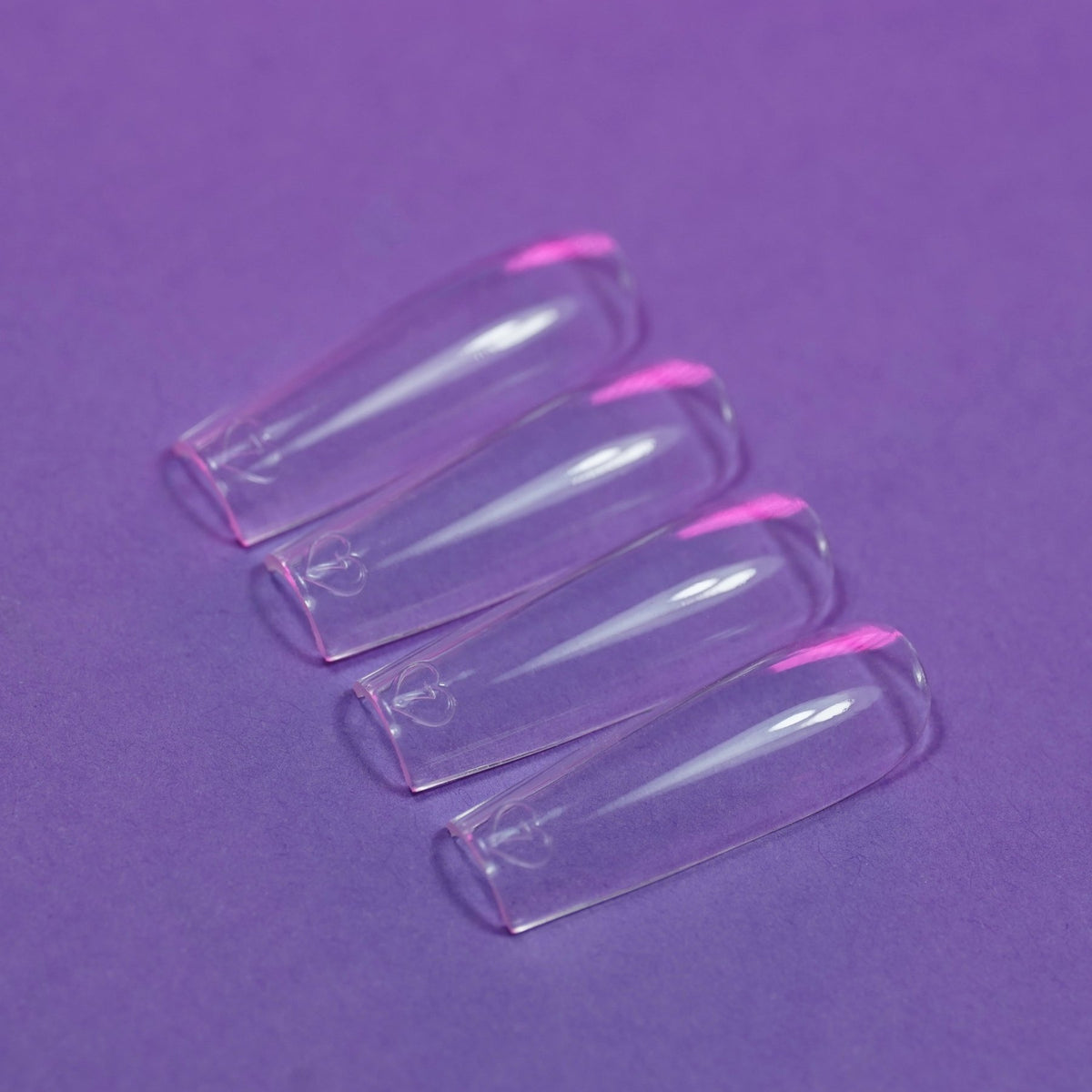 Capsules américaines carré long transparentes posées à plat