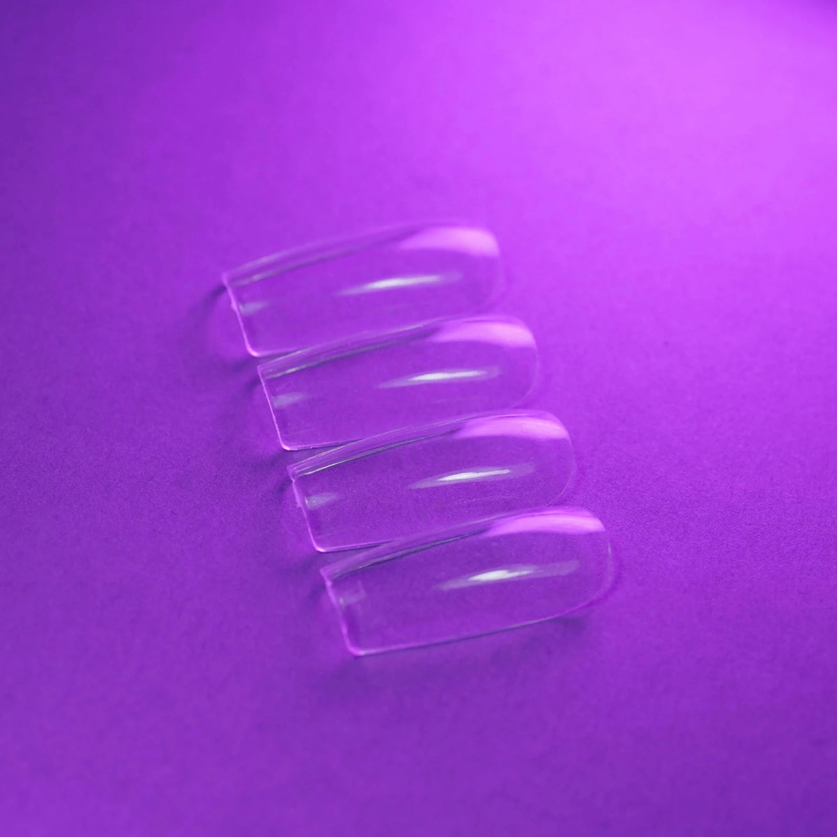 Capsules américaines carré médium transparentes posées à plat