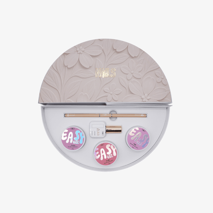 Box spéciale french NAILS FRS ouverte : coffret métal rond avec les trois gels, le vernis et le pinceau