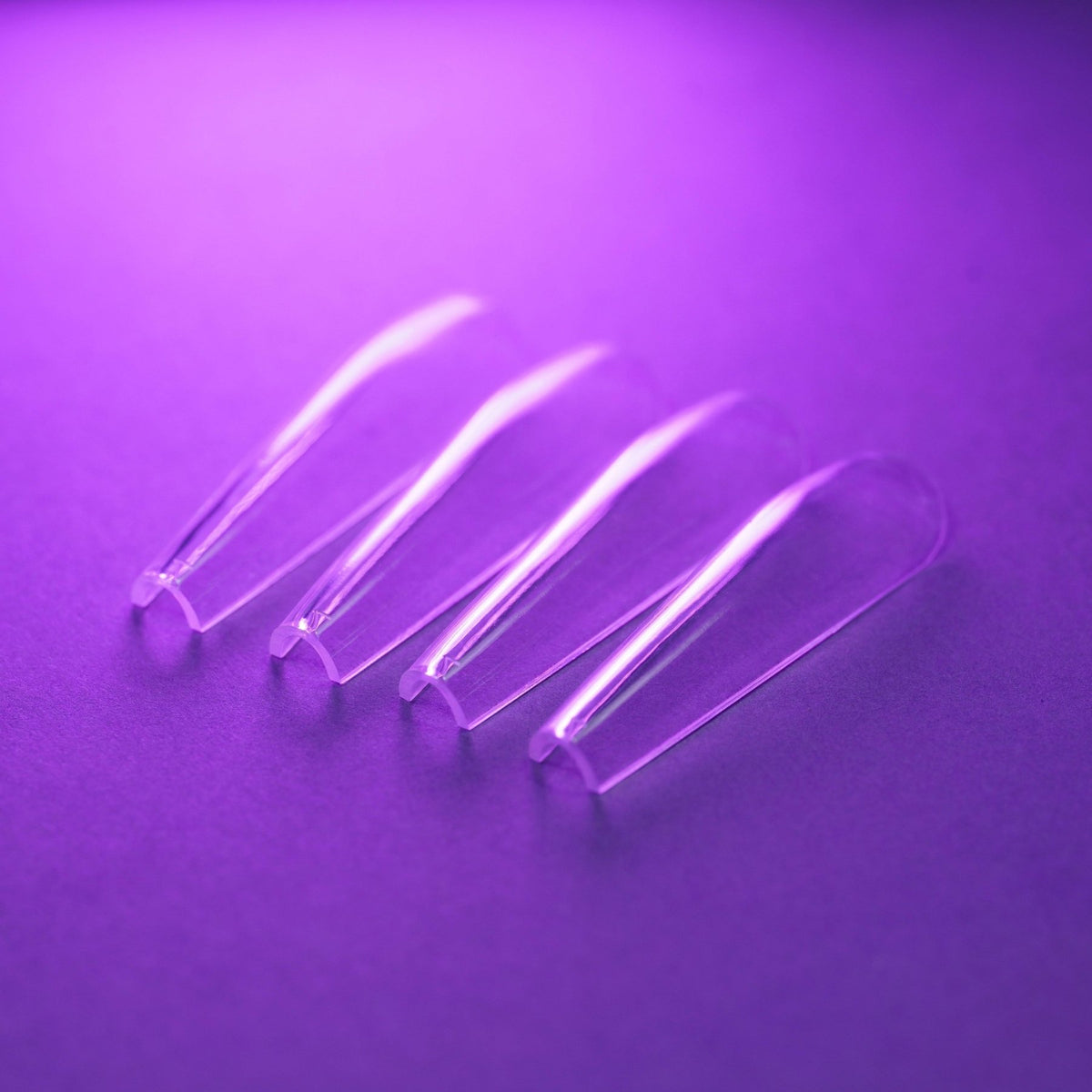 Capsules américaines ballerine XL transparentes posées à plat, second angle