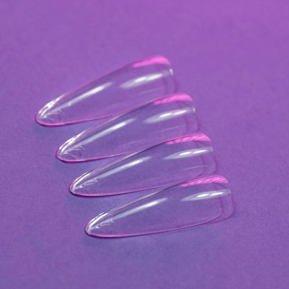 Capsules américaines amande longue transparentes posées à plat