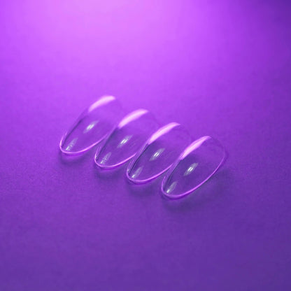 Capsules américaines amande médium natural transparentes posées à plat
