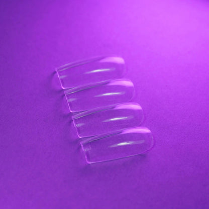 Capsules américaines carré médium transparentes posées à plat